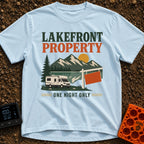 Overnight Lakefront Property - T-Shirt in Chambray - A graphic of a Class C motorhome parked next to a lake, pine trees,...