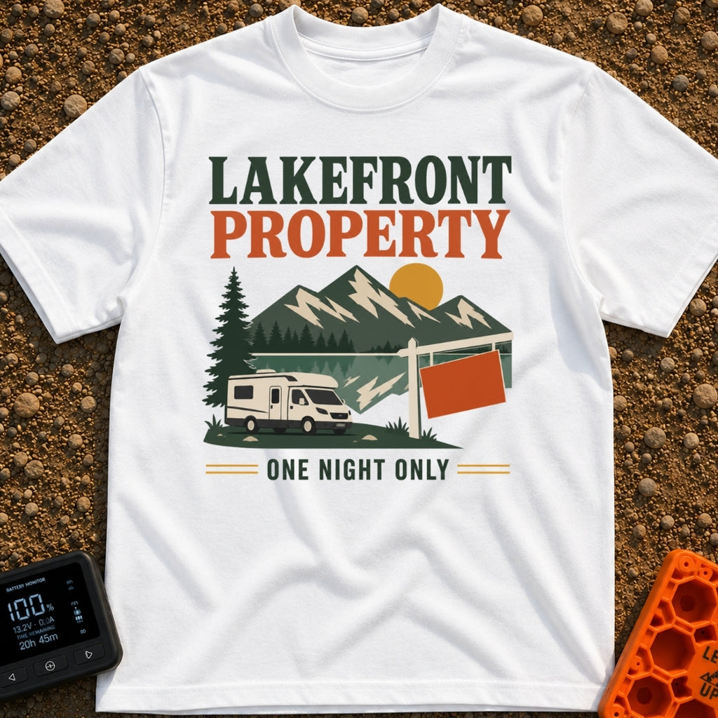 Overnight Lakefront Property - T-Shirt in White - A graphic of a Class C motorhome parked next to a lake, pine trees, and...