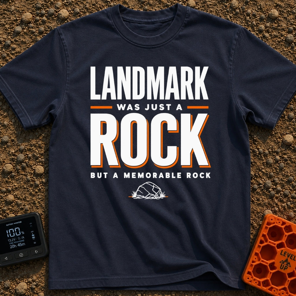 Just A Glorified Rock - T-Shirt in Navy - A typographic design reading "LANDMARK WAS JUST A ROCK BUT A MEMORABLE ROCK"...