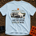 Sunset Power Break - T-Shirt in Chambray - A camper van is parked with its side door open next to a long, straight road...