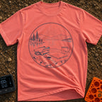 Launch Before Coffee Cools - T-Shirt in Watermelon - A line-art illustration inside a circle showing a folded drone, a...