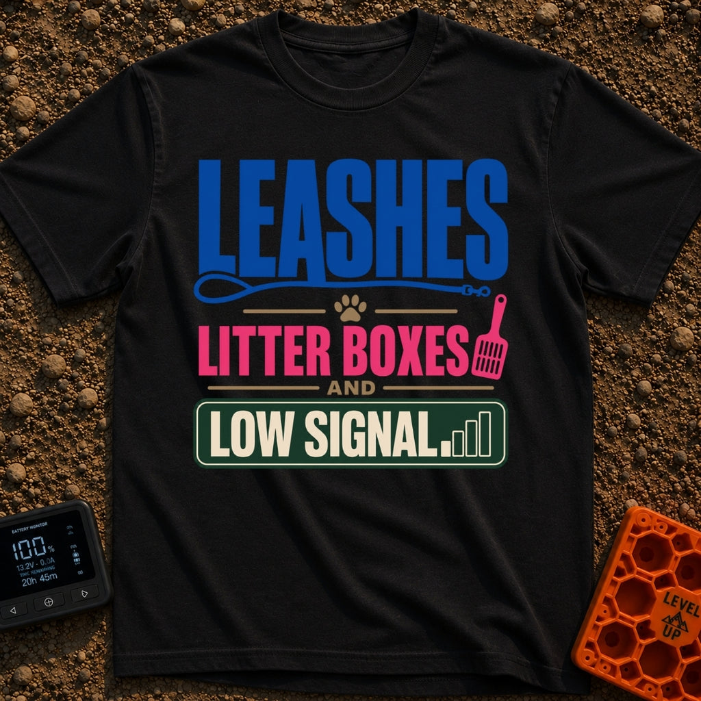Leashes And Low Signal - T-Shirt in Black - A typographic design reading "LEASHES LITTER BOXES AND LOW SIGNAL" stacked...