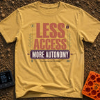 Freedom Over Connection - T-Shirt in Mustard - A typographic design featuring the large text "LESS ACCESS" above a banner...