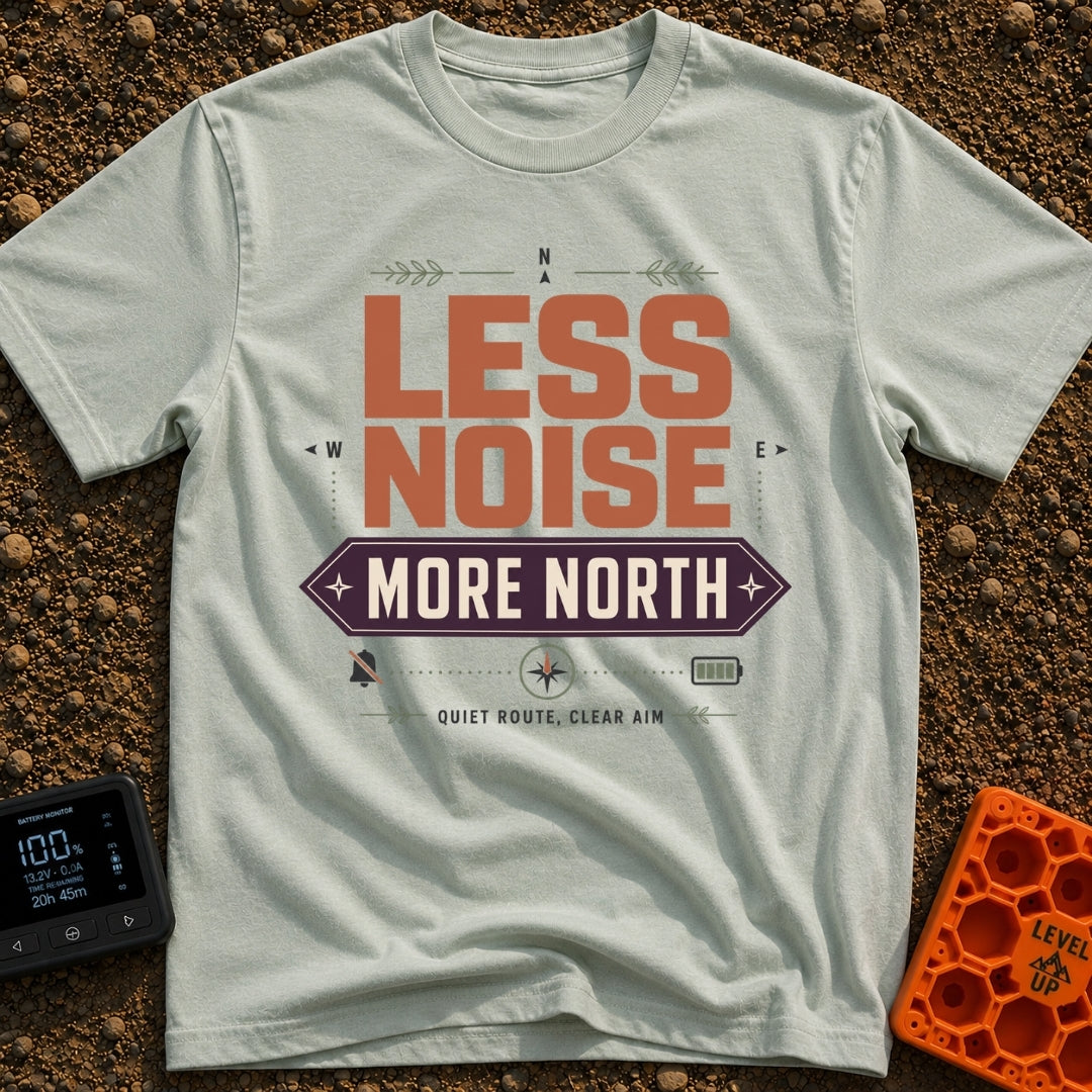 Less Noise More North - T-Shirt in Bay - A typographic design featuring the text "LESS NOISE" in large orange letters...