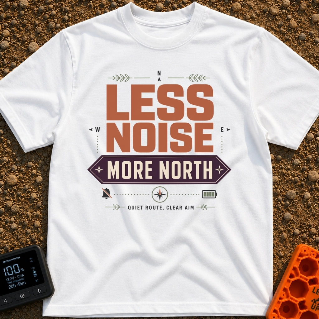 Less Noise More North - T-Shirt in White - A typographic design featuring the text "LESS NOISE" in large orange letters...