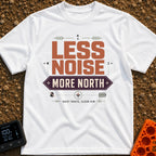 Less Noise More North - T-Shirt in White - A typographic design featuring the text "LESS NOISE" in large orange letters...