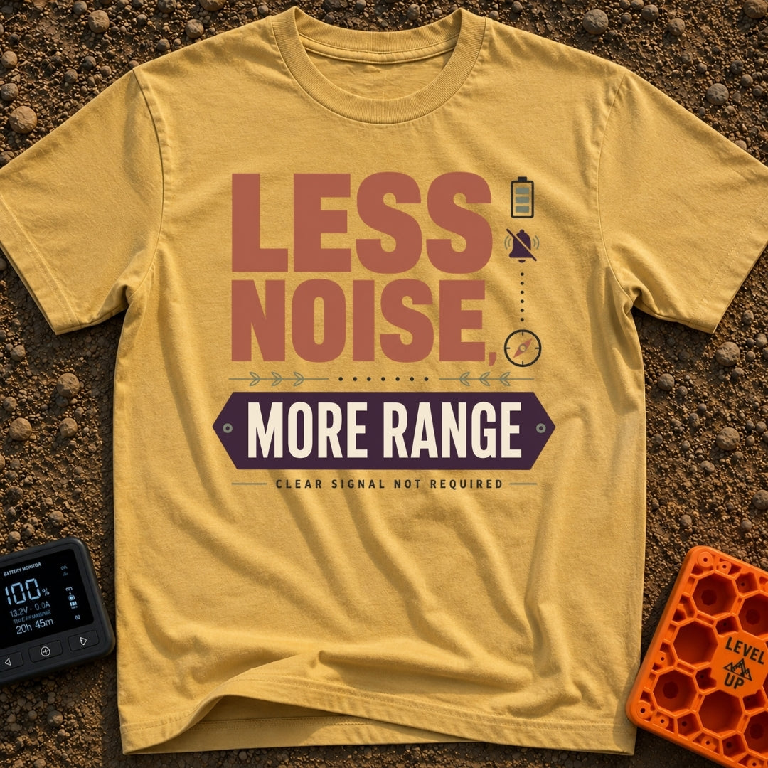 Less Noise More Range - T-Shirt in Mustard - The artwork features the large typographic text "LESS NOISE, MORE RANGE"...