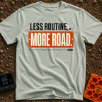 Nomad Mode Activated - T-Shirt in Bay - A typographic design featuring the text "LESS ROUTINE." next to a toggle switch,...