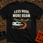 Less Rush More Roam - T-Shirt in Black - A graphic illustration of a white camper van with a roof-mounted solar panel...