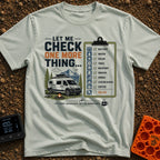 Just One More Check - T-Shirt in Bay - A graphic featuring a white camper van parked by a campfire and camp chair with...