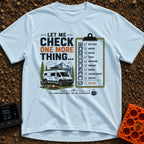 Just One More Check - T-Shirt in Chambray - A graphic featuring a white camper van parked by a campfire and camp chair...