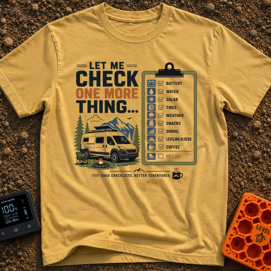 Just One More Check - T-Shirt in Mustard - A graphic featuring a white camper van parked by a campfire and camp chair...