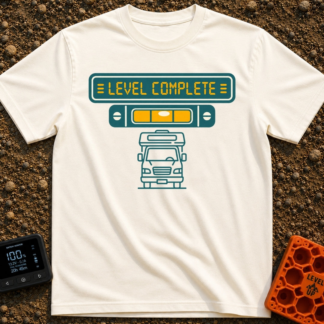 Finally Level Complete - T-Shirt in Ivory - A graphical design featuring a teal sign with yellow text reading 'LEVEL...