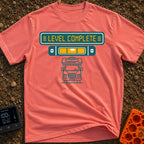 Finally Level Complete - T-Shirt in Watermelon - A graphical design featuring a teal sign with yellow text reading 'LEVEL...