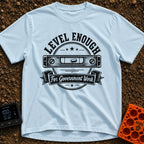 Looks Level To Me - T-Shirt in Chambray - A distressed, black-and-white circular badge design featuring a horizontal...
