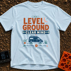 Level Headed Nomad - T-Shirt in Chambray - A typographic graphic reading "LEVEL GROUND CLEAR MIND" featuring a blue...