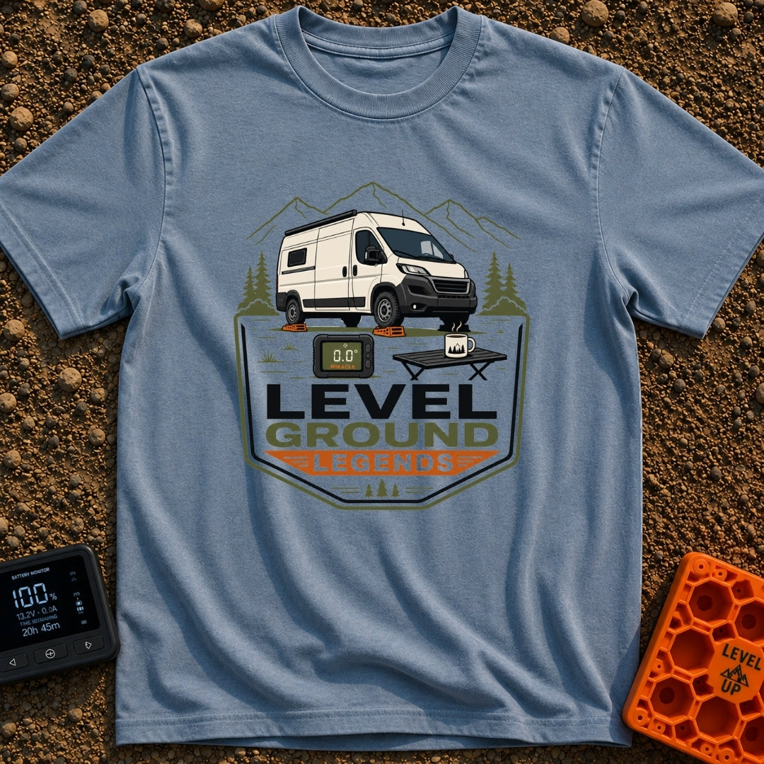 Level Ground Legends - T-Shirt in Blue Jean - A white camper van parked on orange leveling blocks in front of mountains...