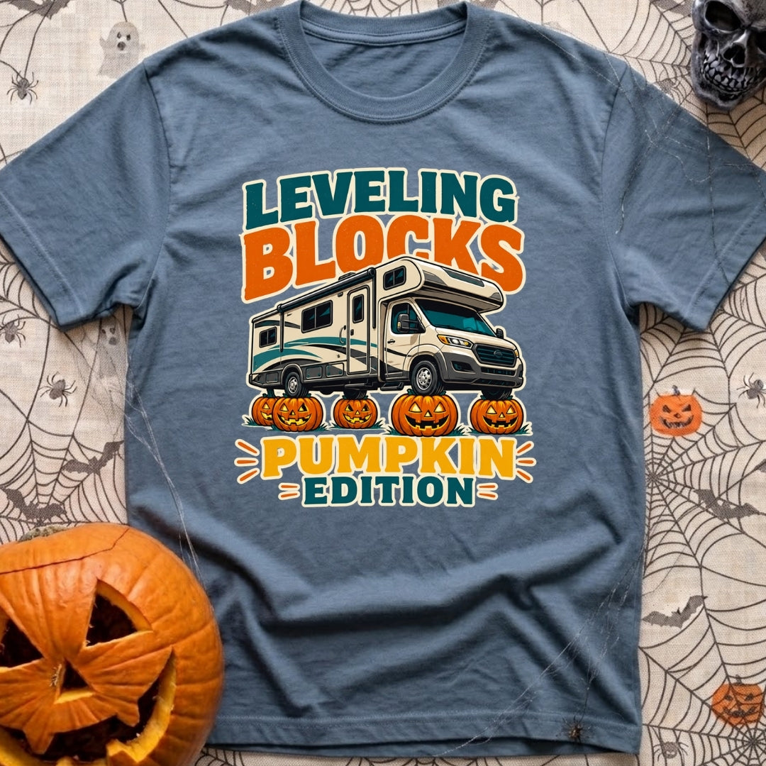 Pumpkin Spice Leveling - T-Shirt in Blue Jean - A graphic showing a Class C motorhome parked with its tires resting on...