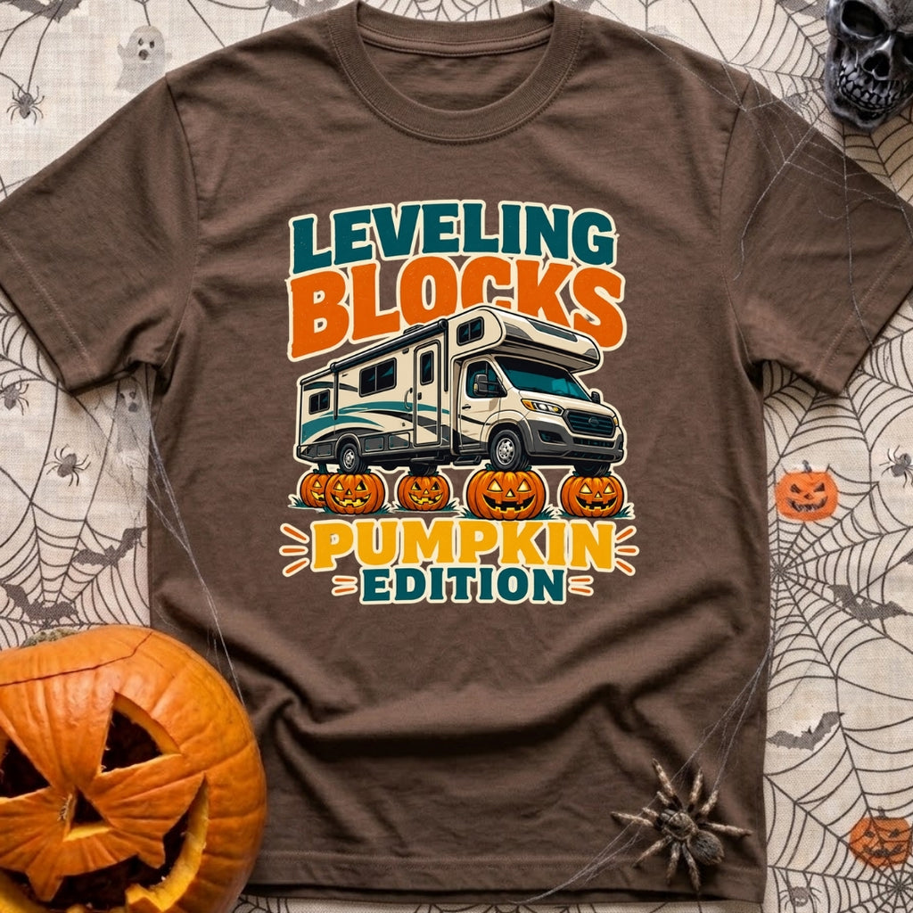 Pumpkin Spice Leveling - T-Shirt in Espresso - A graphic showing a Class C motorhome parked with its tires resting on top...