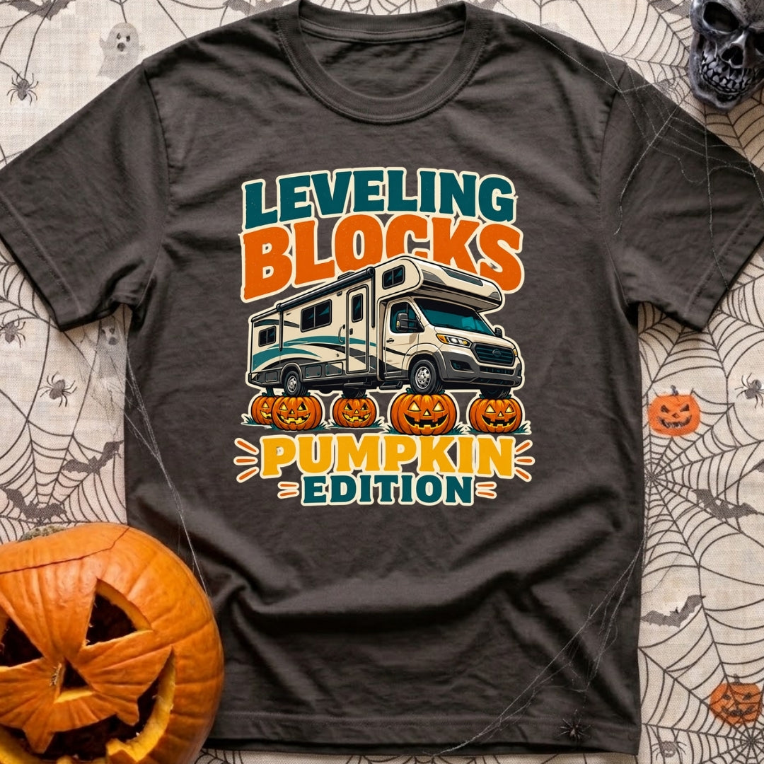 Pumpkin Spice Leveling - T-Shirt in Graphite - A graphic showing a Class C motorhome parked with its tires resting on top...