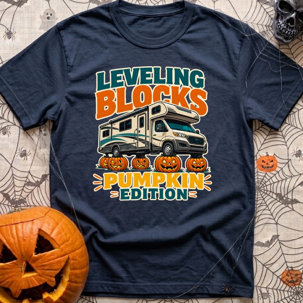 Pumpkin Spice Leveling - T-Shirt in Navy - A graphic showing a Class C motorhome parked with its tires resting on top of...