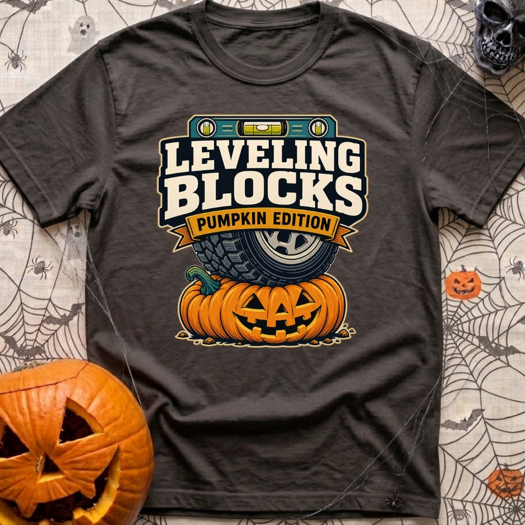 Next Level Gourds - T-Shirt in Graphite - A graphic illustration showing a large off-road vehicle tire parked directly on...