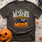 Next Level Gourds - T-Shirt in Graphite - A graphic illustration showing a large off-road vehicle tire parked directly on...