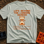 Escape The Loading Screen - T-Shirt in Bay - A retro 8-bit style graphic featuring an orange hourglass with the word...