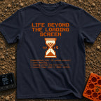 Escape The Loading Screen - T-Shirt in Navy - A retro 8-bit style graphic featuring an orange hourglass with the word...