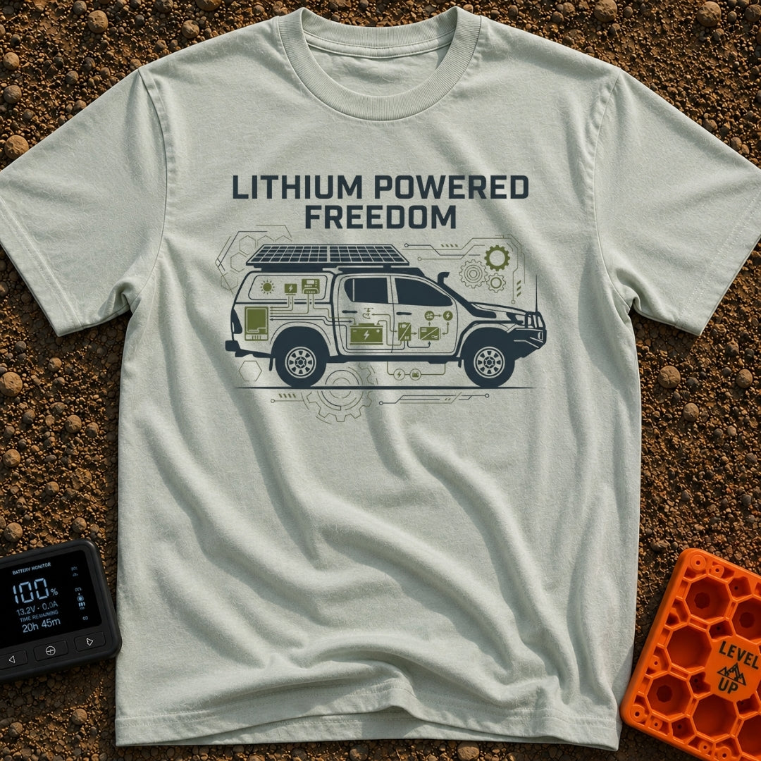 Electric Escape Plan - T-Shirt in Bay - A side-profile graphic of a pickup truck with a camper shell and roof-mounted...