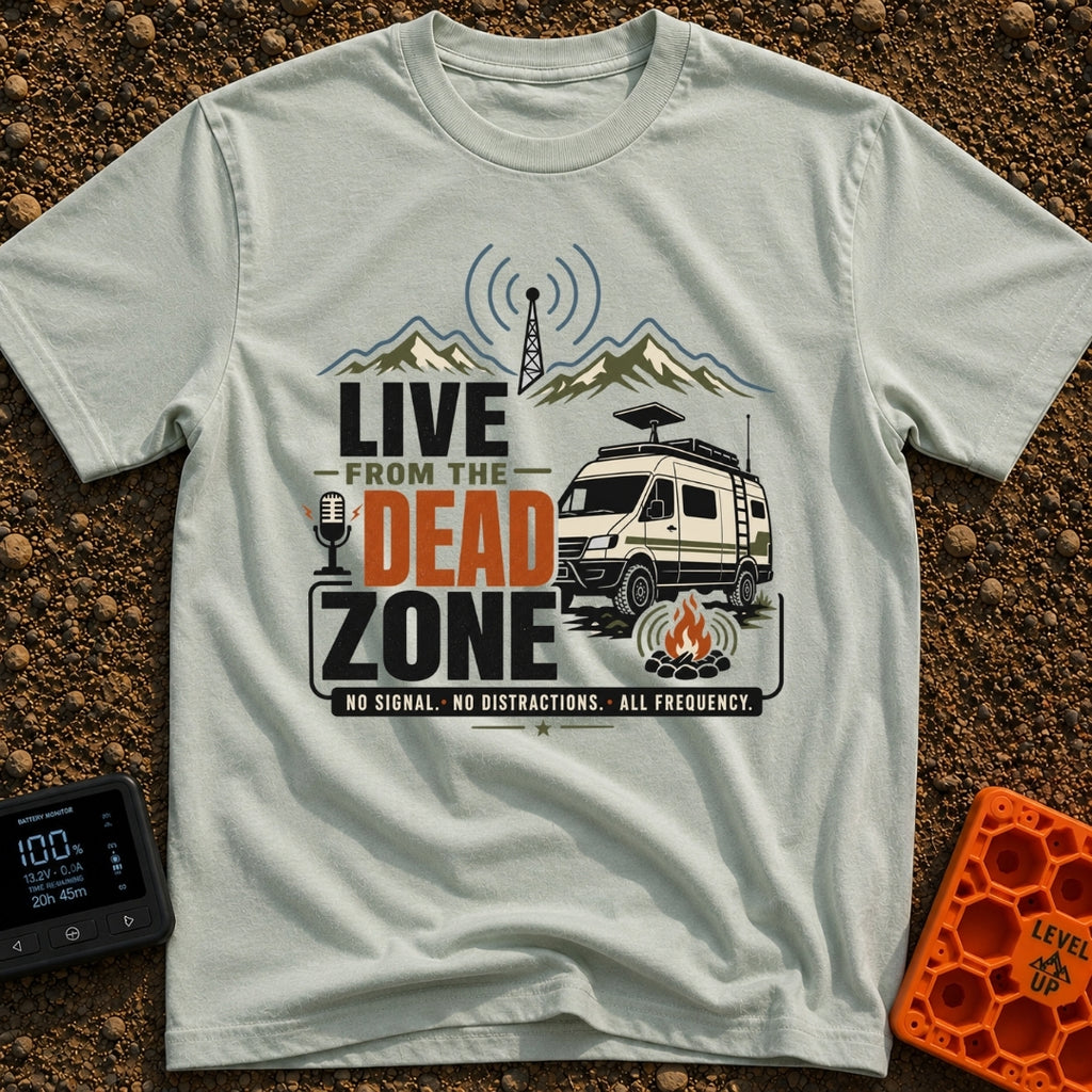 Dead Zone Live - T-Shirt in Bay - A graphic featuring an off-road camper van parked near a campfire with mountains and a...