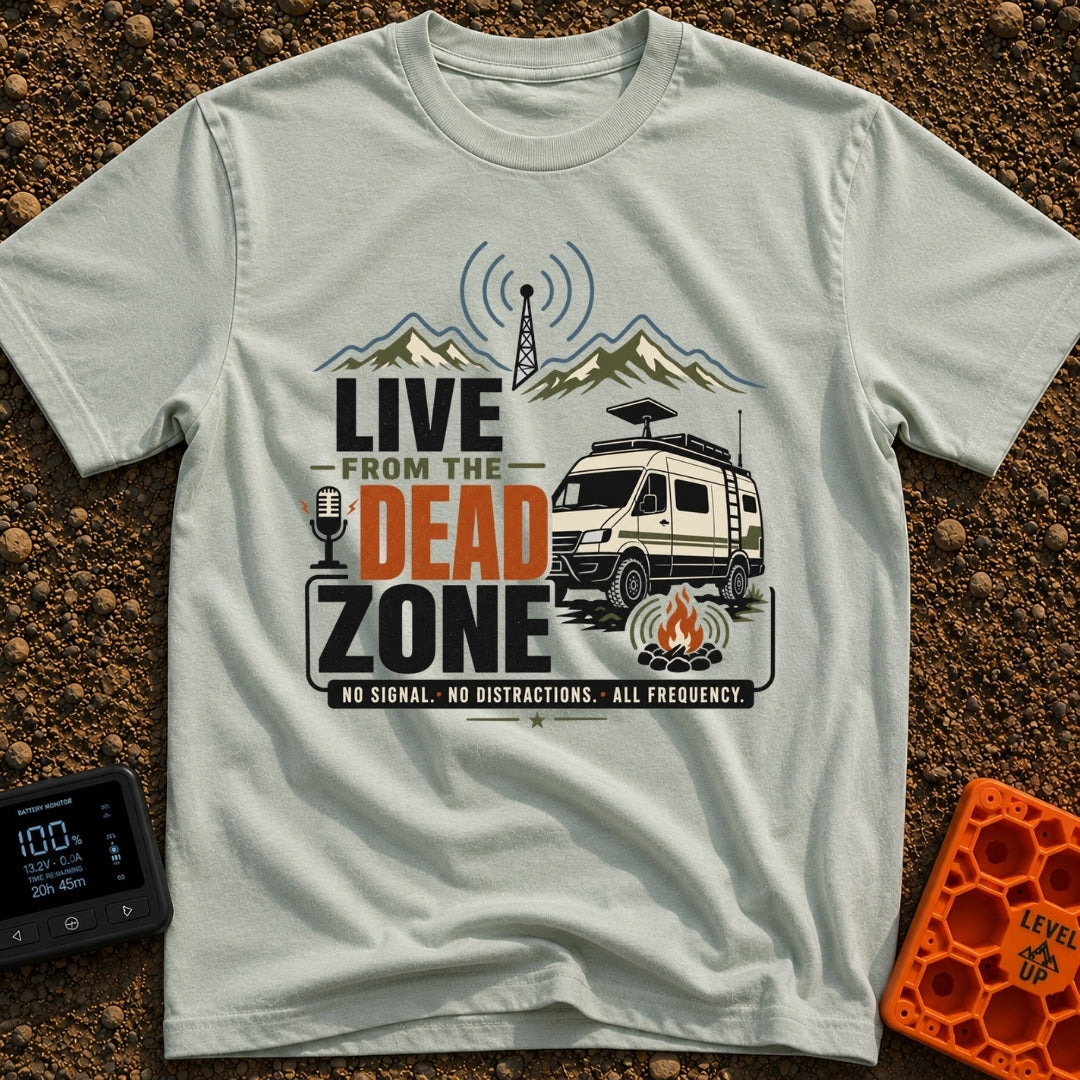 Dead Zone Live - T-Shirt in Bay - A graphic featuring an off-road camper van parked near a campfire with mountains and a...