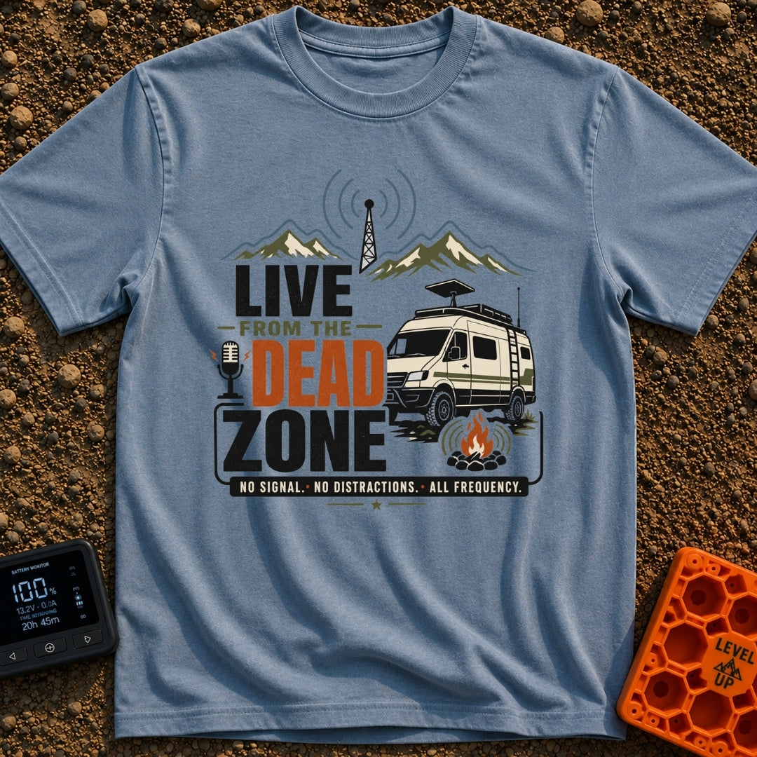 Dead Zone Live - T-Shirt in Blue Jean - A graphic featuring an off-road camper van parked near a campfire with mountains...