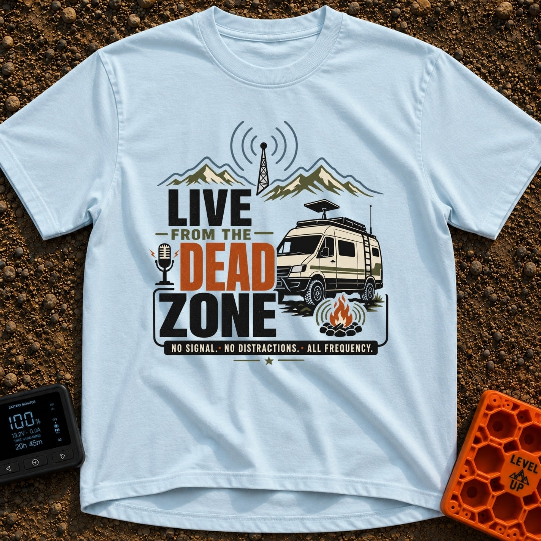 Dead Zone Live - T-Shirt in Chambray - A graphic featuring an off-road camper van parked near a campfire with mountains...