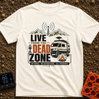 Dead Zone Live - T-Shirt in Ivory - A graphic featuring an off-road camper van parked near a campfire with mountains and...