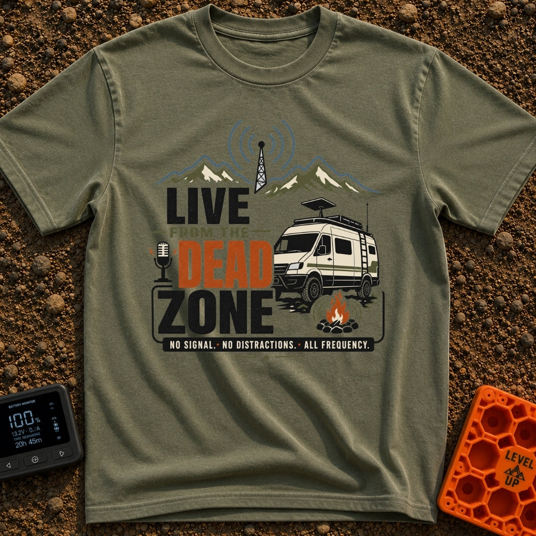 Dead Zone Live - T-Shirt in Moss - A graphic featuring an off-road camper van parked near a campfire with mountains and a...