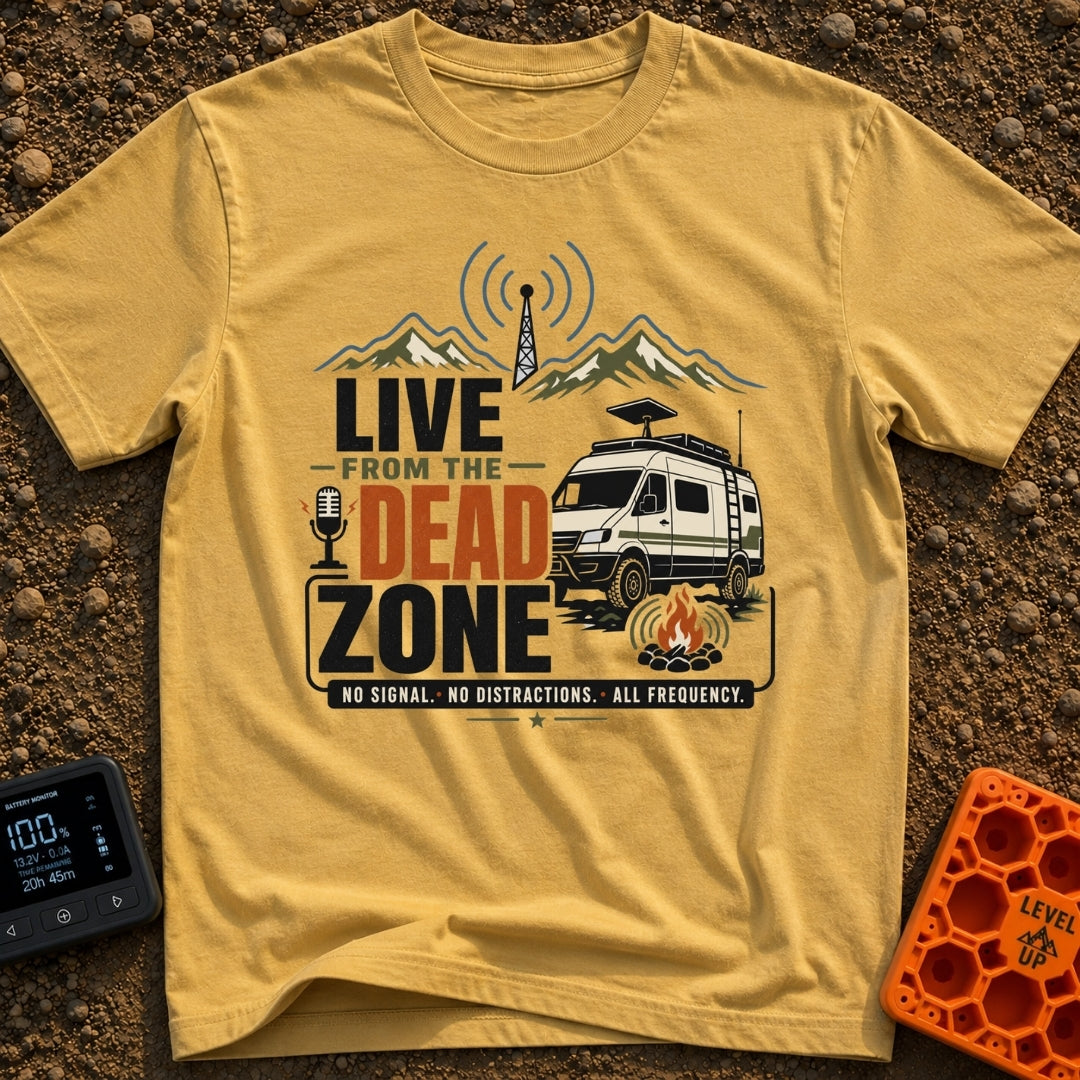 Dead Zone Live - T-Shirt in Mustard - A graphic featuring an off-road camper van parked near a campfire with mountains...
