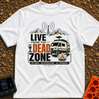 Dead Zone Live - T-Shirt in White - A graphic featuring an off-road camper van parked near a campfire with mountains and...