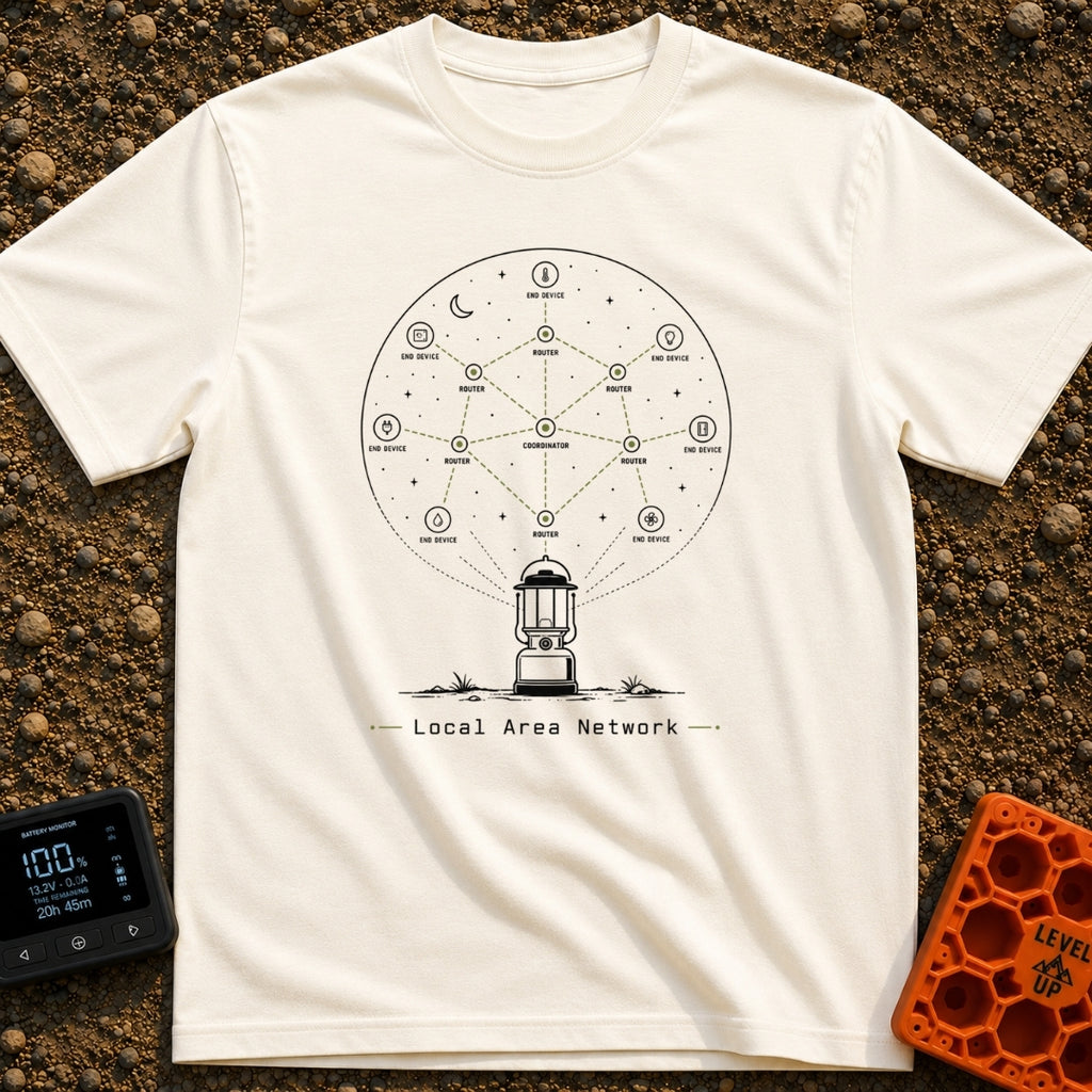 Lantern Networked Nights - T-Shirt in Ivory - A line drawing of a classic camping lantern on the ground, with a large...