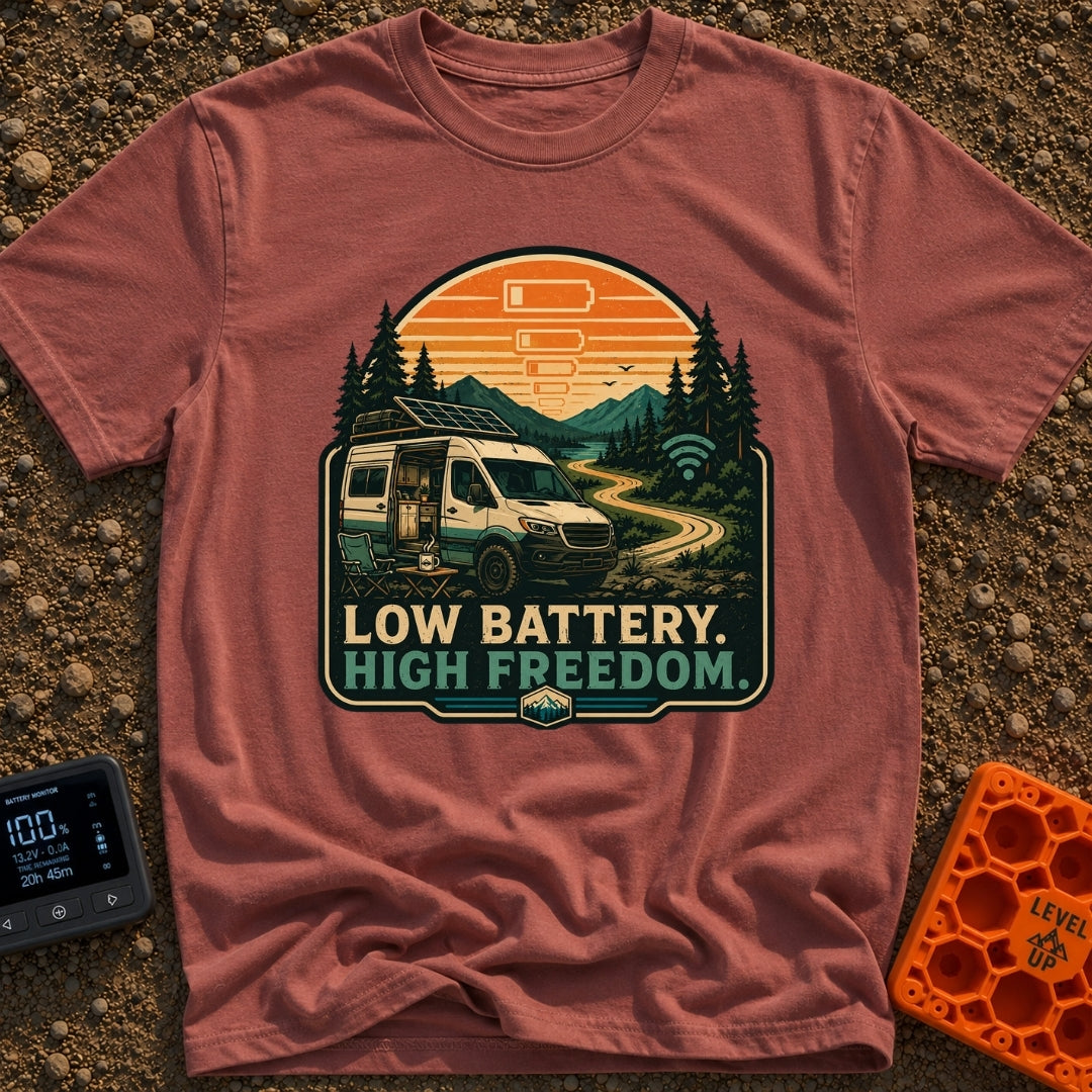 Dead Phone Live Free - T-Shirt in Brick - An illustration of a camper van parked on a winding dirt mountain road with its...