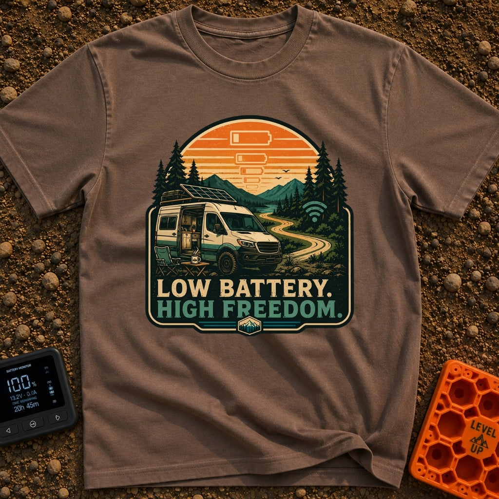 Dead Phone Live Free - T-Shirt in Espresso - An illustration of a camper van parked on a winding dirt mountain road with...