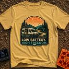 Dead Phone Live Free - T-Shirt in Mustard - An illustration of a camper van parked on a winding dirt mountain road with...