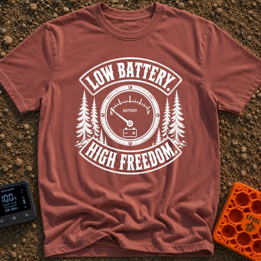 Unplugged And Free - T-Shirt in Brick - A distressed black-and-white illustration of an analog battery gauge with its...