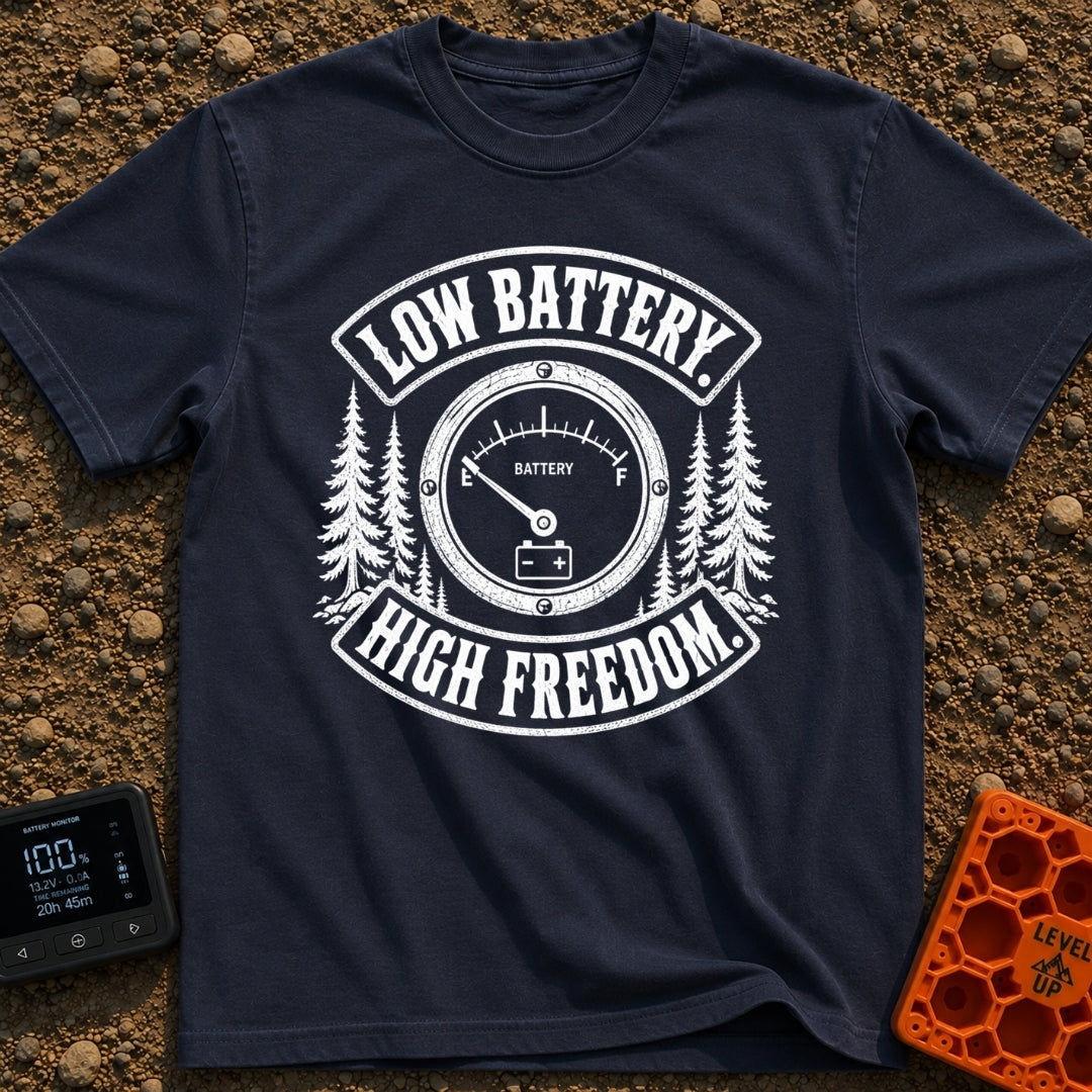 Unplugged And Free - T-Shirt in Navy - A distressed black-and-white illustration of an analog battery gauge with its...