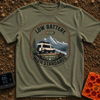 Low Battery High Standards - T-Shirt in Moss - A badge-style graphic featuring a white camper van parked on a dirt...