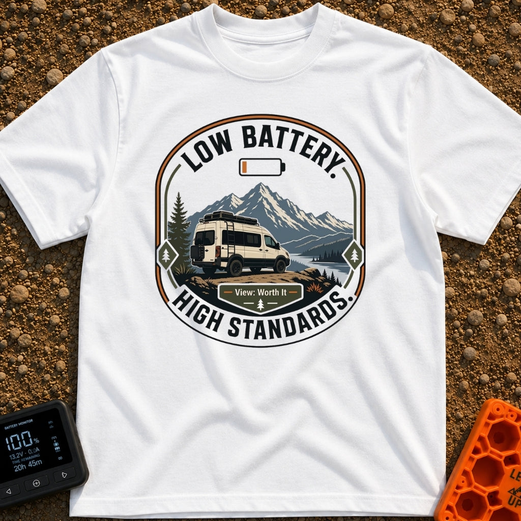 Low Battery High Standards - T-Shirt in White - A badge-style graphic featuring a white camper van parked on a dirt...