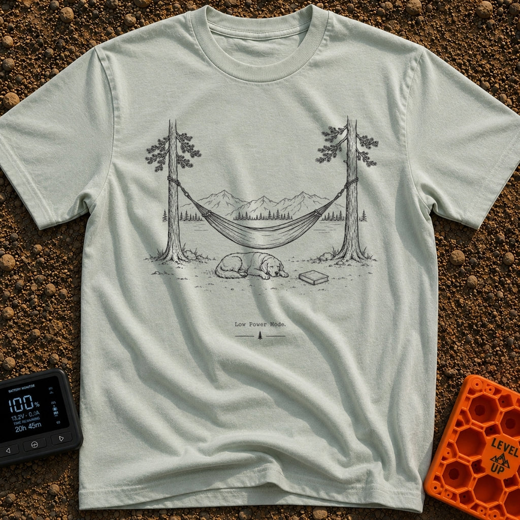 Low Power Mode - T-Shirt in Bay - A black-and-white line illustration of a hammock strung between two pine trees in front...