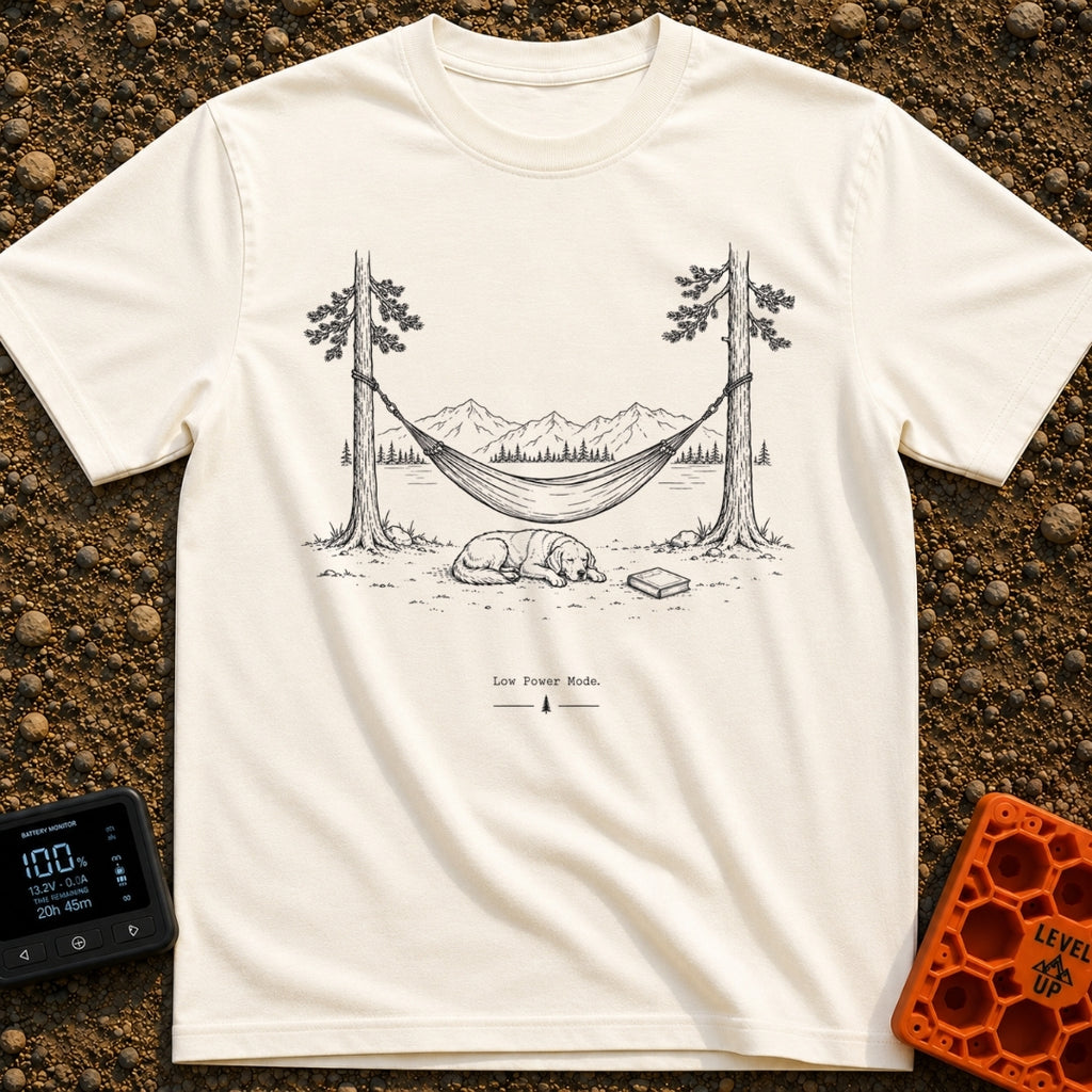 Low Power Mode - T-Shirt in Ivory - A black-and-white line illustration of a hammock strung between two pine trees in...