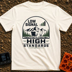 Low Bars High Standards - T-Shirt in Ivory - An emblem-style illustration featuring the text 'LOW SIGNAL' next to a cell...