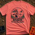 Low Bars High Standards - T-Shirt in Watermelon - An emblem-style illustration featuring the text 'LOW SIGNAL' next to a...